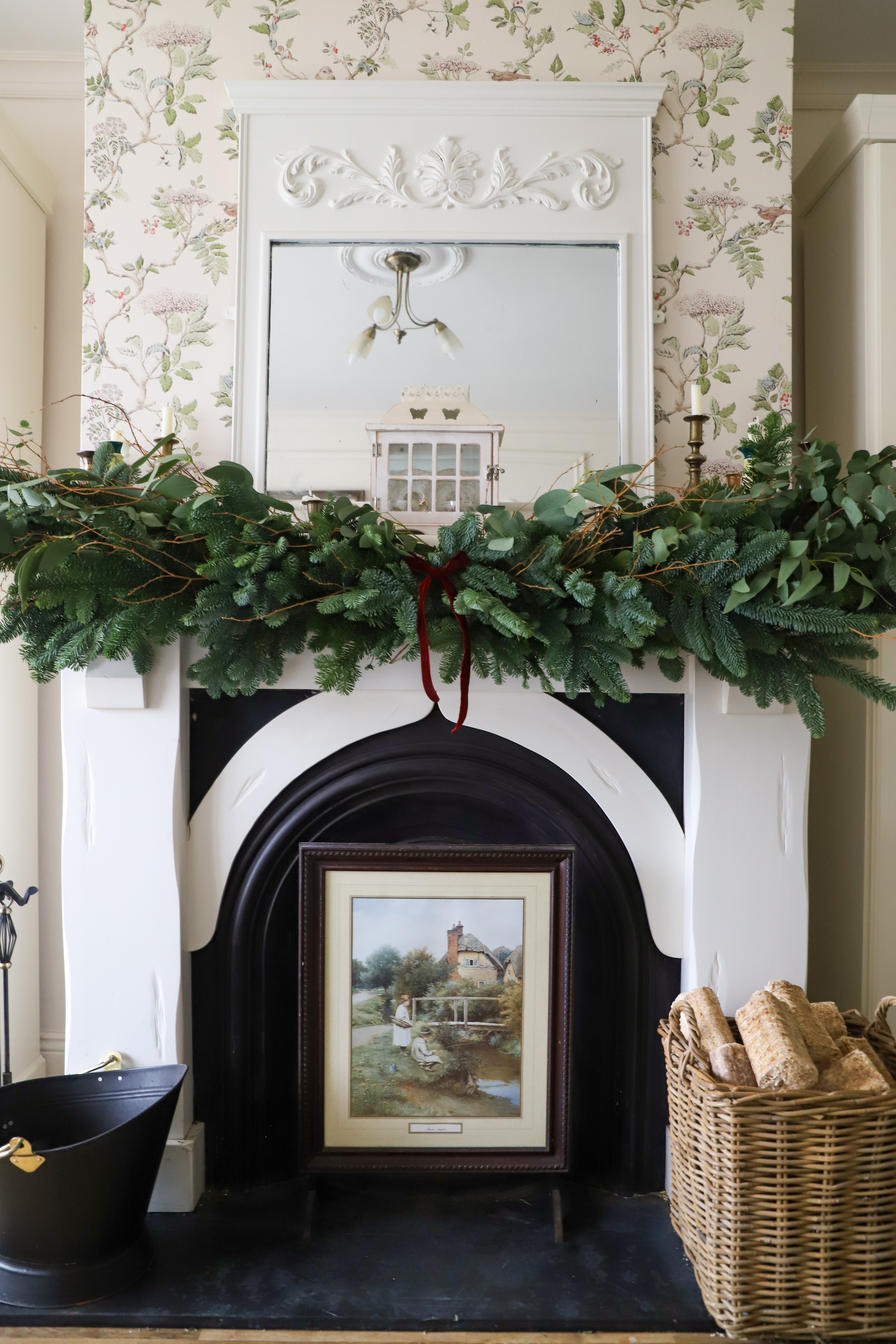 Green garland sitting on mantelpiece